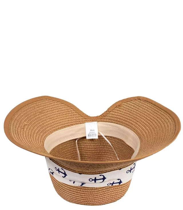 Stylish straw hat with a bow in anchors