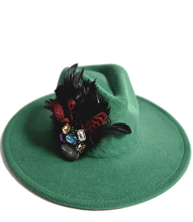 Elegant women's hat with large brooch with feathers and colored zircons