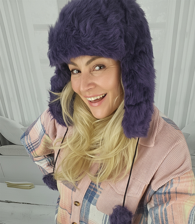 Warm women's earflap hat