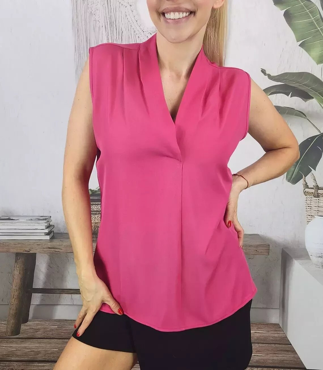 Elegant blouse with a ruffled V-neckline