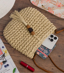 Small summer shoulder bag made of paper raffia adjustable strap