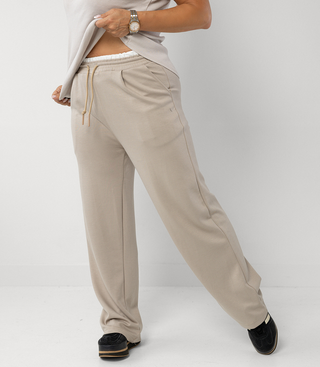 Comfortable sweatpants made of soft material with white insert at the waist LUNA