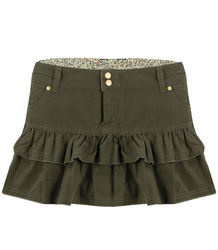 Short mini skirt with ruffles on the hips
