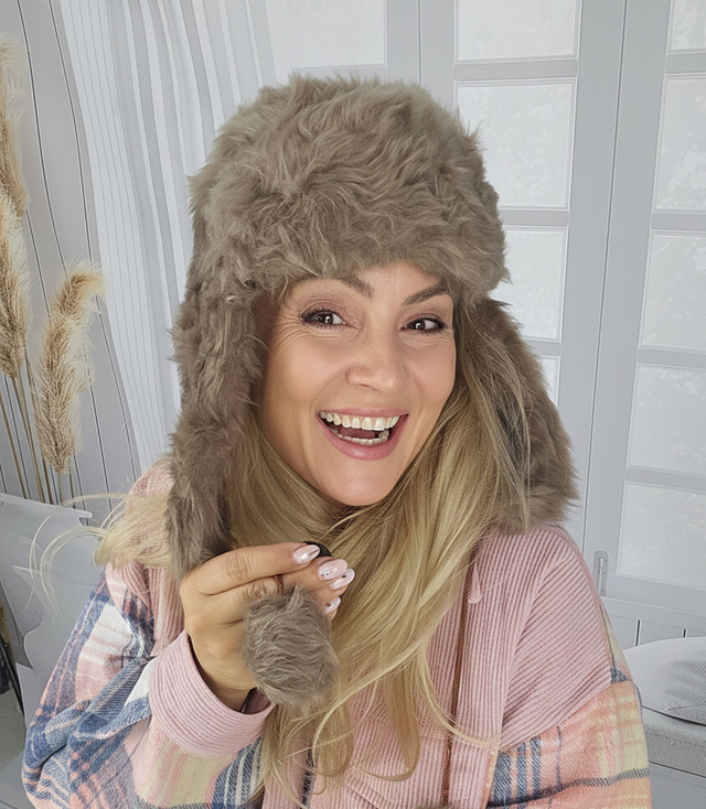 Warm women's earflap hat