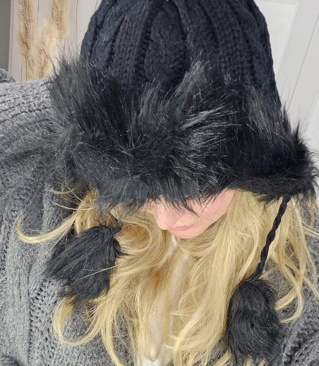 Warm winter beanie with fur trim and pom-pom