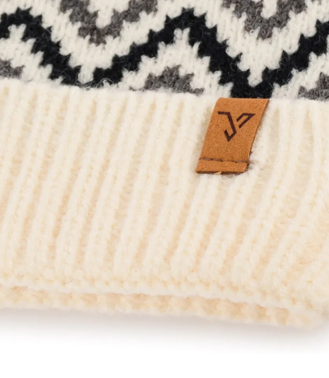 Warm women's cap with pom-pom zigzag pattern autumn winter