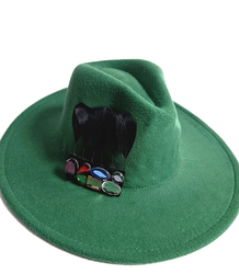 Elegant women's fedora hat with decorative brooch with colored zircons