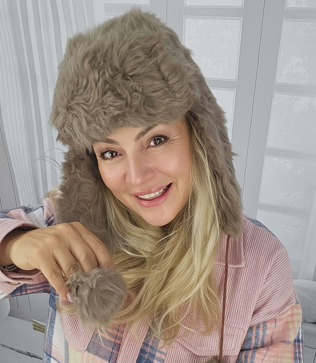 Warm women's earflap hat 