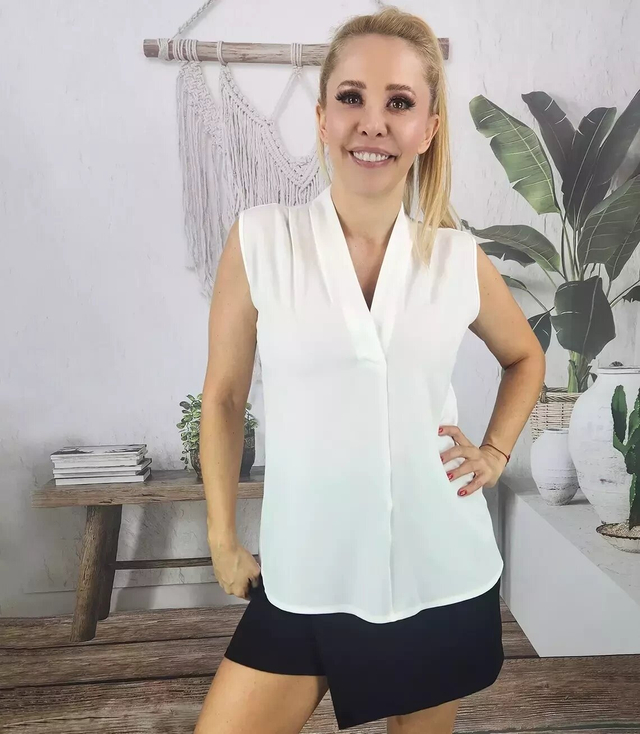 Elegant blouse with a ruffled V-neckline
