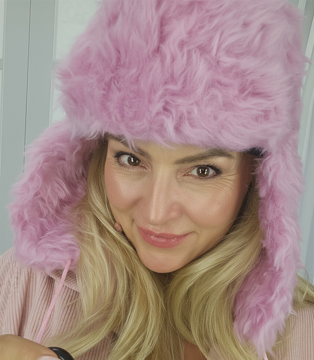 Warm women's earflap hat 