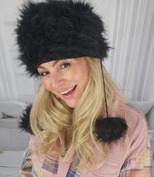 Fluffy winter beanie with pom-poms on strings