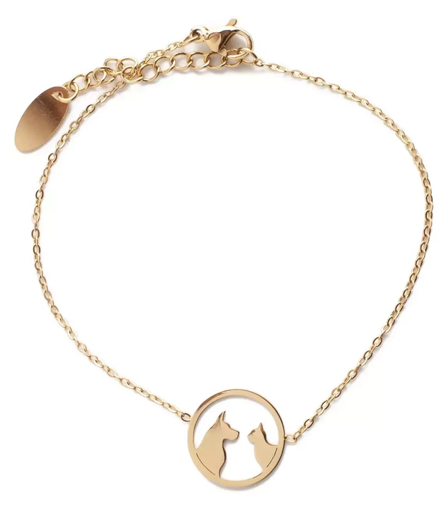 Gold bracelet with a dog and a cat in a circle