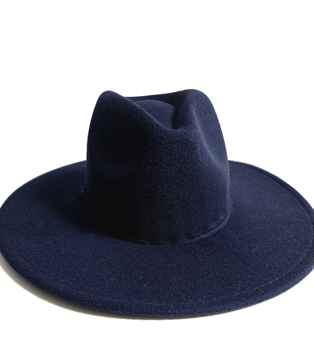 Elegant women's fedora hat with decorative brooch with colored zircons
