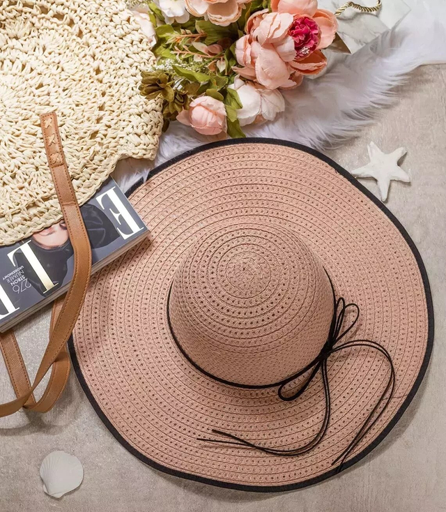 Elegant women's straw hat with a ribbon