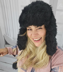 Warm women's earflap hat 