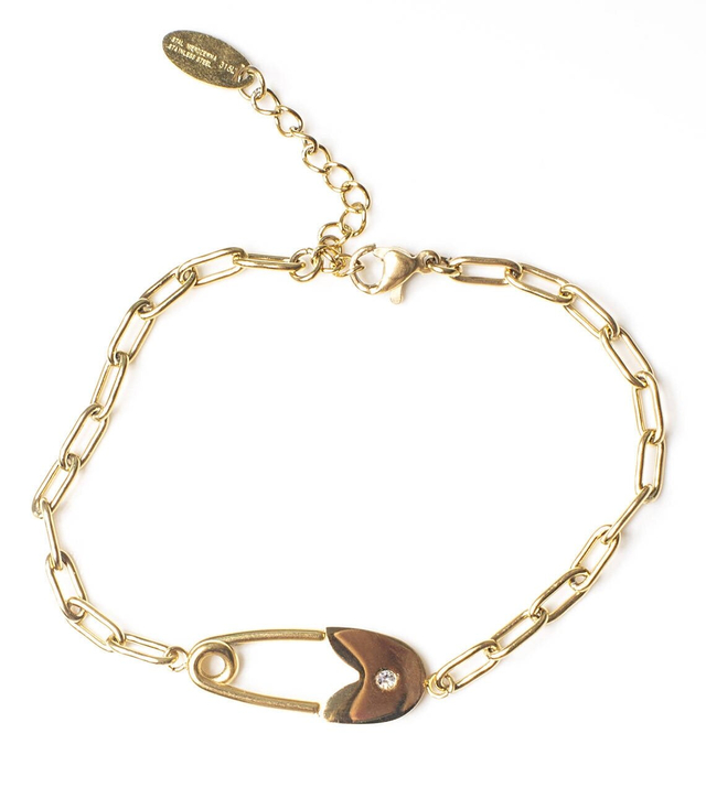 Gold bracelet with a safety pin on a chain
