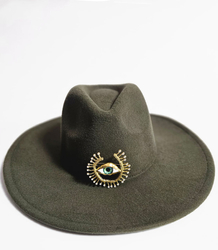 Elegant women's panama hat with decorative brooch "Eye of Elegance"