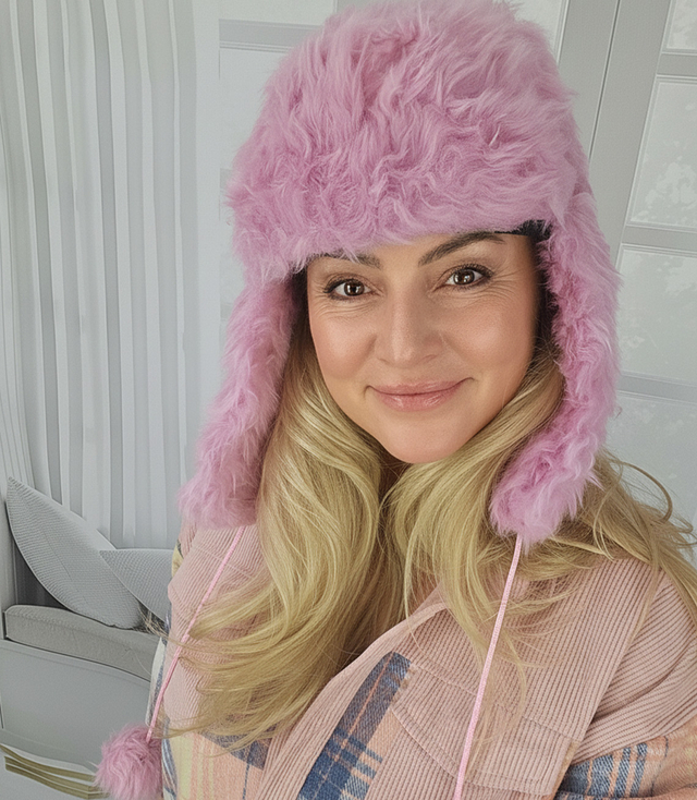 Warm women's earflap hat