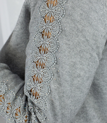 Knit dress with openwork sleeves and pockets