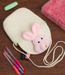 Children's straw bag with plush bunny 