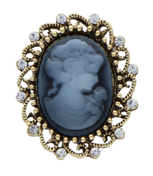 Brooch with zircons and crystals. Beautiful decorative gold safety pin