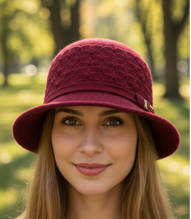 Women's hat with decorative strap and buckle