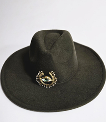 Elegant women's panama hat with decorative brooch "Eye of Elegance"