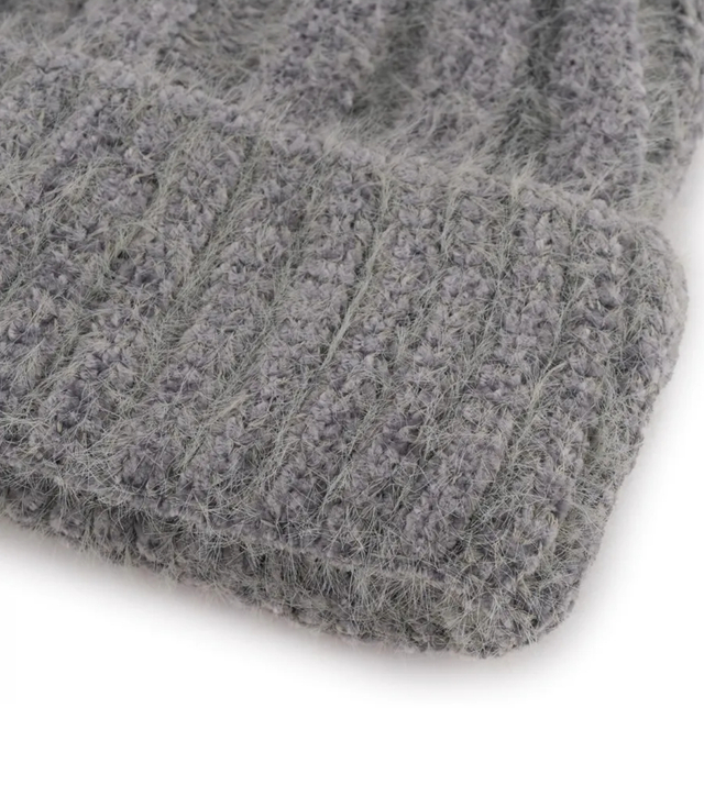 Warm women's beanie with pom-pom in ribbed weave autumn winter