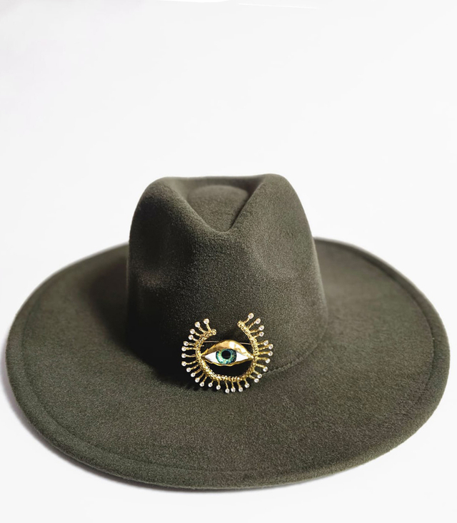 Elegant women's panama hat with decorative brooch "Eye of Elegance"