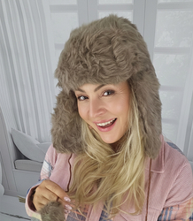 Warm women's earflap hat 