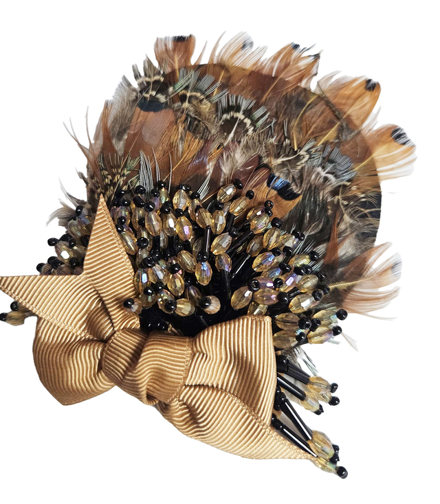 Beautiful decorative brooch with bow and feathers in shades of brown