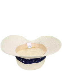 Stylish straw hat with a bow in anchors