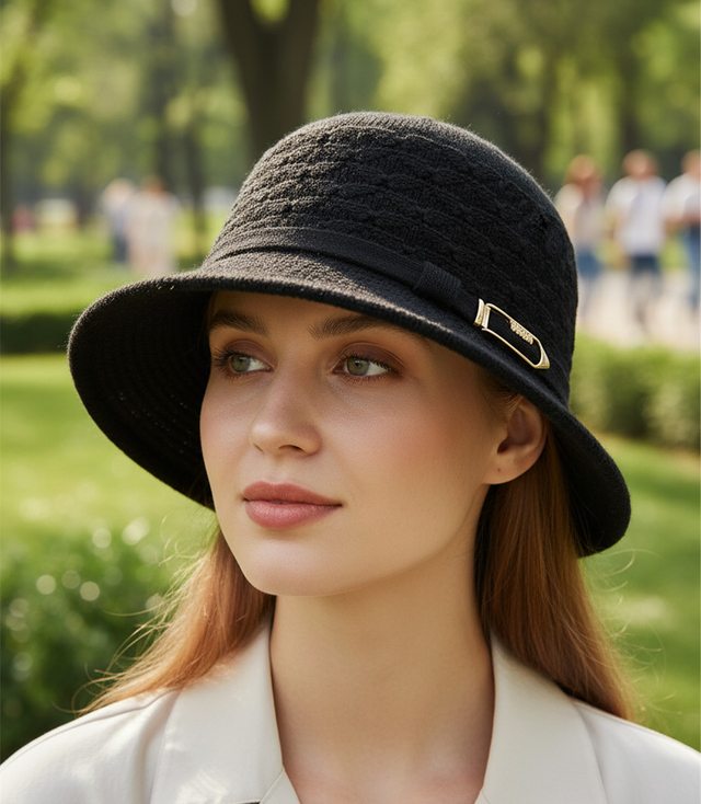 Women's hat with decorative strap and buckle