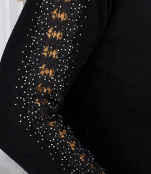 Knit dress with openwork sleeves and pockets