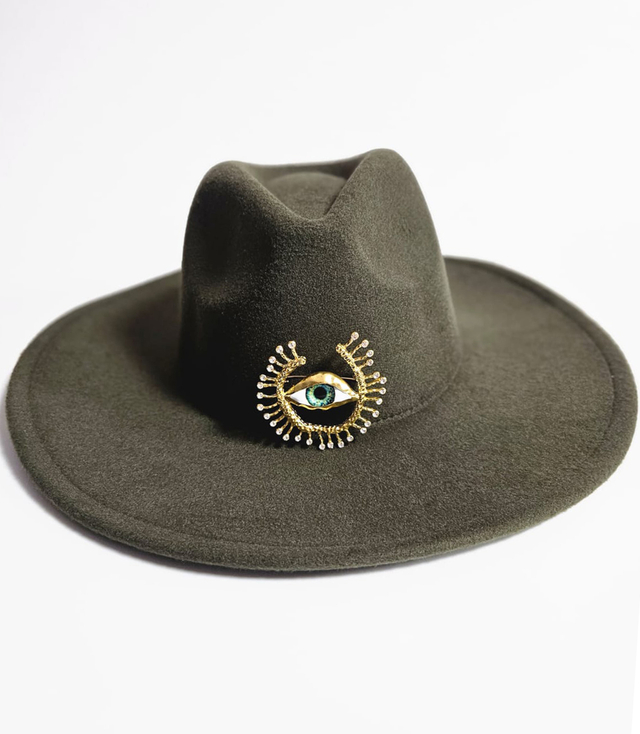 Elegant women's panama hat with decorative brooch "Eye of Elegance"