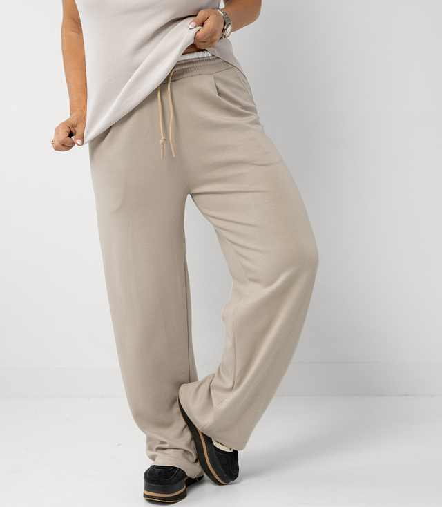 Comfortable sweatpants made of soft material with white insert at the waist LUNA