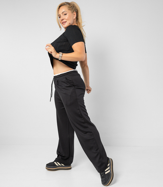 Comfortable sweatpants made of soft material with white insert at the waist LUNA