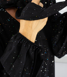 Elegant shiny dress with glamorous binding