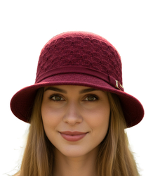 Women's hat with decorative strap and buckle