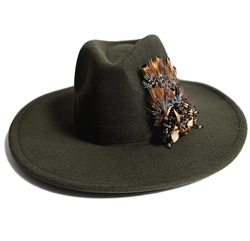 Elegant women's panama hat with decorative brooch with feathers and beads