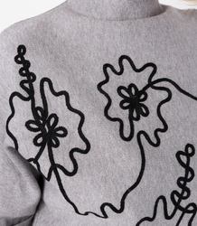 Elegant batwing sweater with half turtleneck and embroidered flowers ABSTRACT BLOOM
