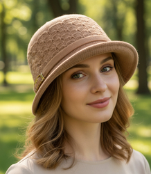 Women's hat with decorative strap and buckle