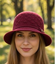 Women's hat with decorative strap and buckle