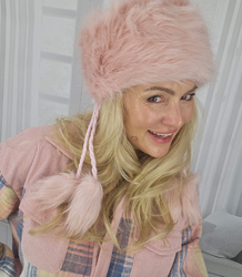 Fluffy winter beanie with pom-poms on strings