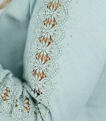 Knit dress with openwork sleeves and pockets