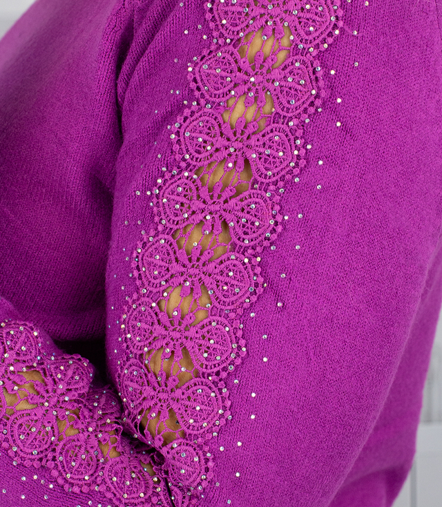 Knit dress with openwork sleeves and pockets