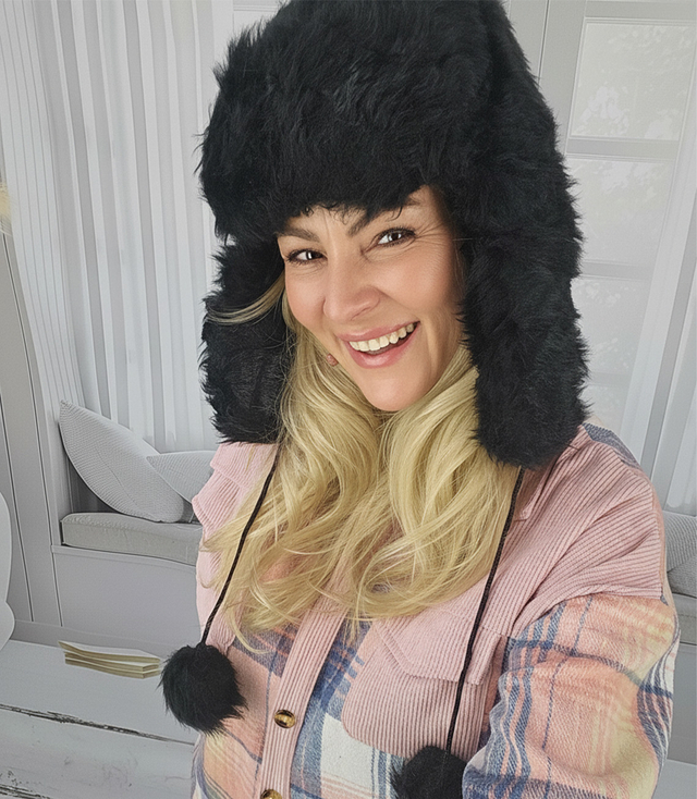 Warm women's earflap hat