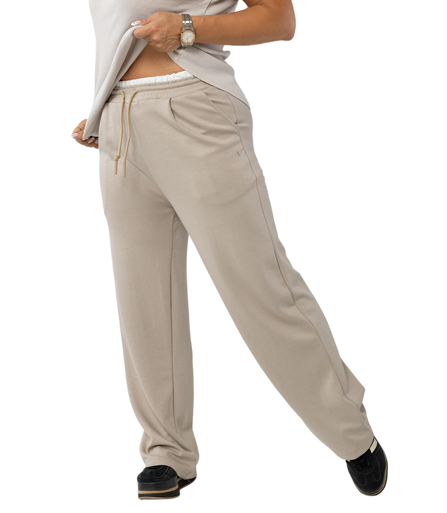 Comfortable sweatpants made of soft material with white insert at the waist LUNA